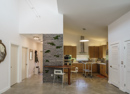 view of kitchen, entry and live moss wall feature